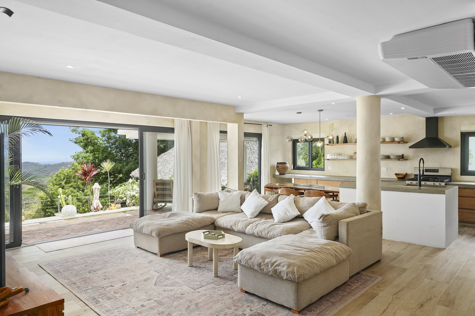 Open-plan living area opening to the view